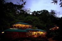 Here's the Finca's base camp and community center at dusk. They form the centerpiece of the property and include a dining hall, an open-air lounge, a WIFI zone, a rancho, a bathhouse, a campfire ring and a wedding garden.