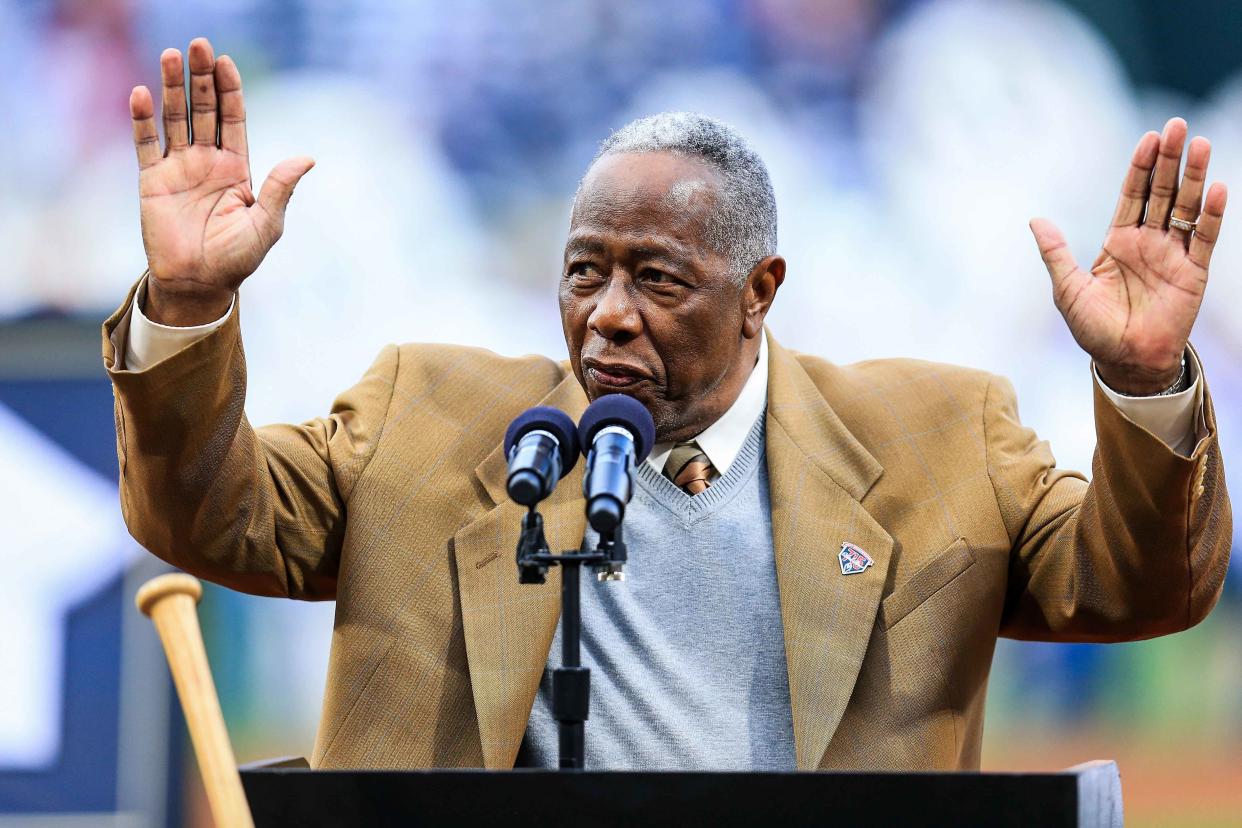 Hank Aaron, here speaking during a ceremony honoring the 40th anniversary of him breaking the home run record in 2014, is perhaps the most famous black players to come out of Bubba Thompson's hometown, Mobile, Ala. Satchel Paige,  Willie McCovey,  Billy Williams and Ozzie Smith were others.