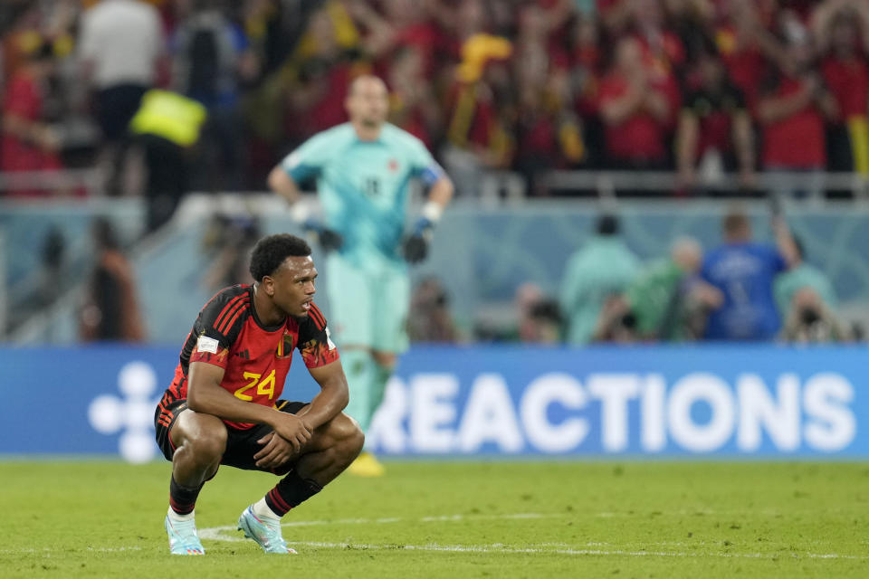 Belgium's Lois Openda crouches on the pitch at the end of the World Cup group F soccer match between Belgium and Canada, at the Ahmad Bin Ali Stadium in Doha, Qatar, Wednesday, Nov. 23, 2022. Belgium won 1-0. (AP Photo/Natacha Pisarenko)