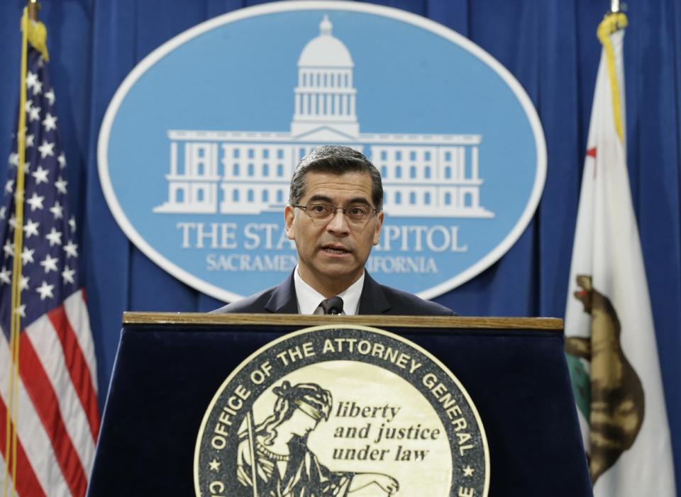 File - In this Jan. 24, 2017, file photo, Xavier Becerra, California's attorney general, talks to reporters at a news conference in Sacramento, Calif. Democratic attorneys general from 15 states have vowed to “use all the tools of our offices” to push back against President Donald Trump’s immigration order in the clearest sign yet that the top lawyers for Democratic-leaning states plan to fight policies coming from the new administration when they believe they are unconstitutional or harmful to the public. (AP Photo/Rich Pedroncelli, File)