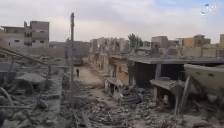 A still image taken from a video released on the internet by Islamic State-affiliated Amaq News Agency, on April 18, 2017, purports to show the aftermath, said to be in al-Bukamal town, in Deir al-Zor province, after air strikes thought to have been directed by planes from a U.S.-led military coalition, Syria. Social Media Website via Reuters TV