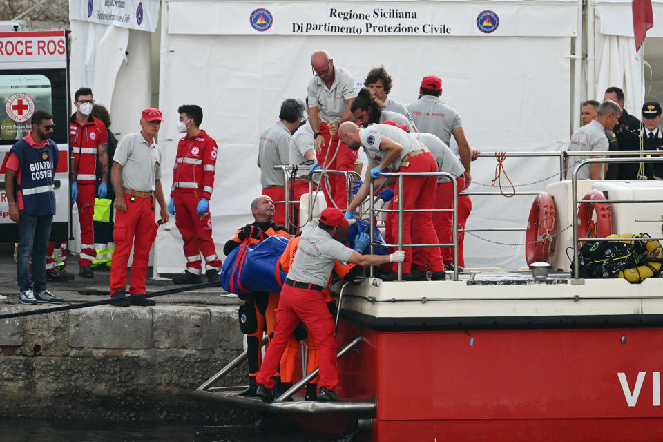 Divers searching for six missing people following the sinking of a superyacht off Sicily in a storm have found fifth bodies.  (Alberto Pizzoli / AFP - Getty Images)