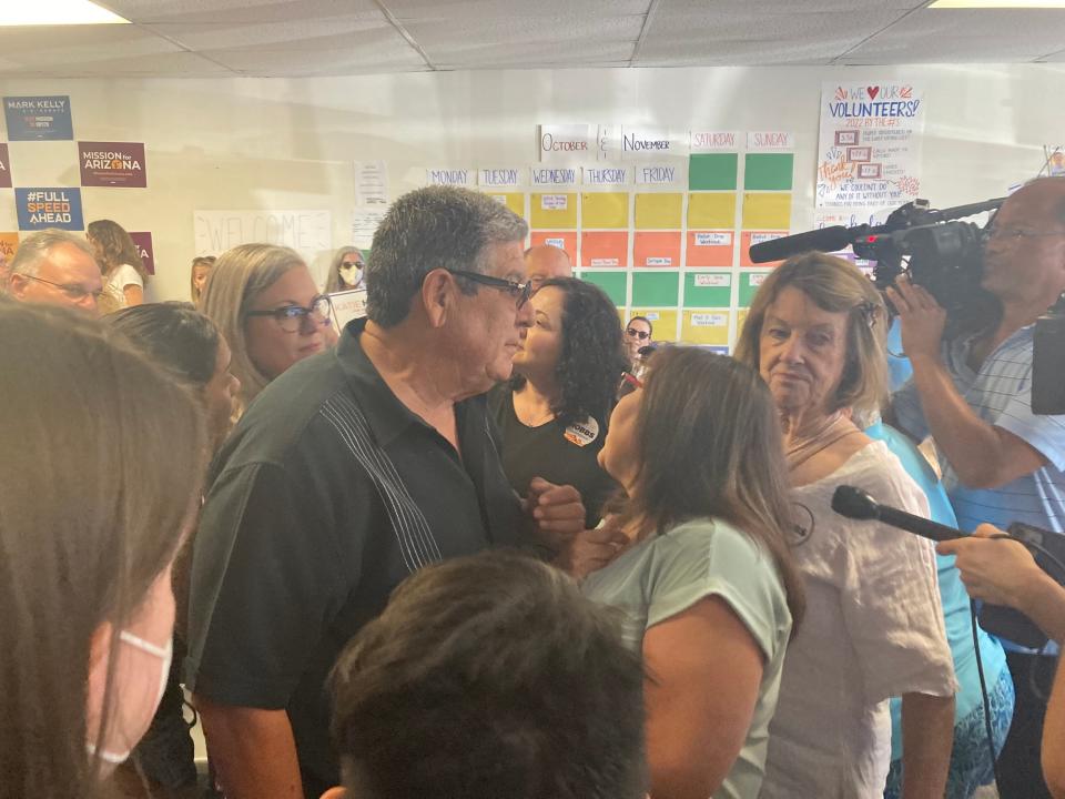 J.M. "Jesse" Torrez gets between then-gubernatorial candidate Katie Hobbs and a person badgering her at a campaign appearance during the 2022 governor's race.