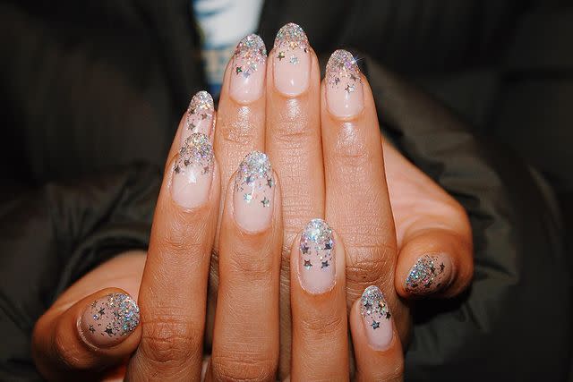 <p>Why do I feel like these snowflake-esque nails are the main character in their own cinematic masterpiece? Probably because they're straight-up gorgeous. Instead of going for a true snowflake design this winter, try cashing in on the wintery vibes with <a href="https://www.target.com/p/1-12oz-glitter-shapes-silver-star-sulyn/-/A-53069914?" rel="nofollow noopener" target="_blank" data-ylk="slk:silver stars;elm:context_link;itc:0;sec:content-canvas" class="link ">silver stars</a> and <a href="https://www.pearnova.com/collections/classic-lacquer/products/night-in-shining-armor" rel="nofollow noopener" target="_blank" data-ylk="slk:silver glitter polish;elm:context_link;itc:0;sec:content-canvas" class="link ">silver glitter polish</a>.</p><p><a href="https://www.instagram.com/p/B5fF2UrH8RR/" rel="nofollow noopener" target="_blank" data-ylk="slk:See the original post on Instagram;elm:context_link;itc:0;sec:content-canvas" class="link ">See the original post on Instagram</a></p>