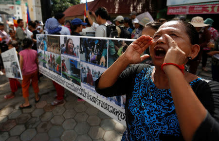 A protester shouts for the release of land activist Tep Vanny during a demonstration in front of the Municipal Court of Phnom Penh, Cambodia, September 19, 2016. REUTERS/Samrang Pring