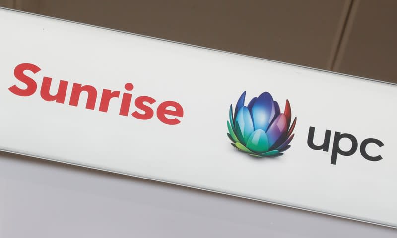 FILE PHOTO: Logos of Swiss telecom company Sunrise and broadband and telecommunications provider UPC Schweiz are seen in Zurich