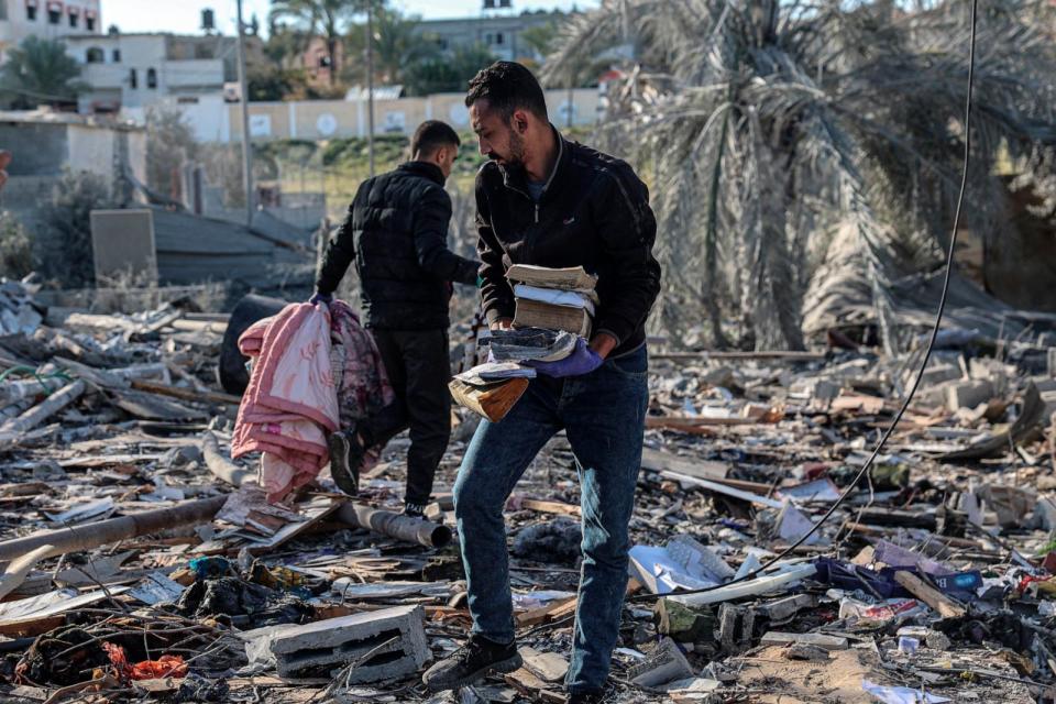 PHOTO: Palestinians search for their belongings amid the rubble of houses destroyed by Israeli bombardment in Rafah in the southern Gaza Strip, March 11, 2024, amid continuing battles between Israel and the Palestinian militant group Hamas.  (Said Khatib/AFP via Getty Images)
