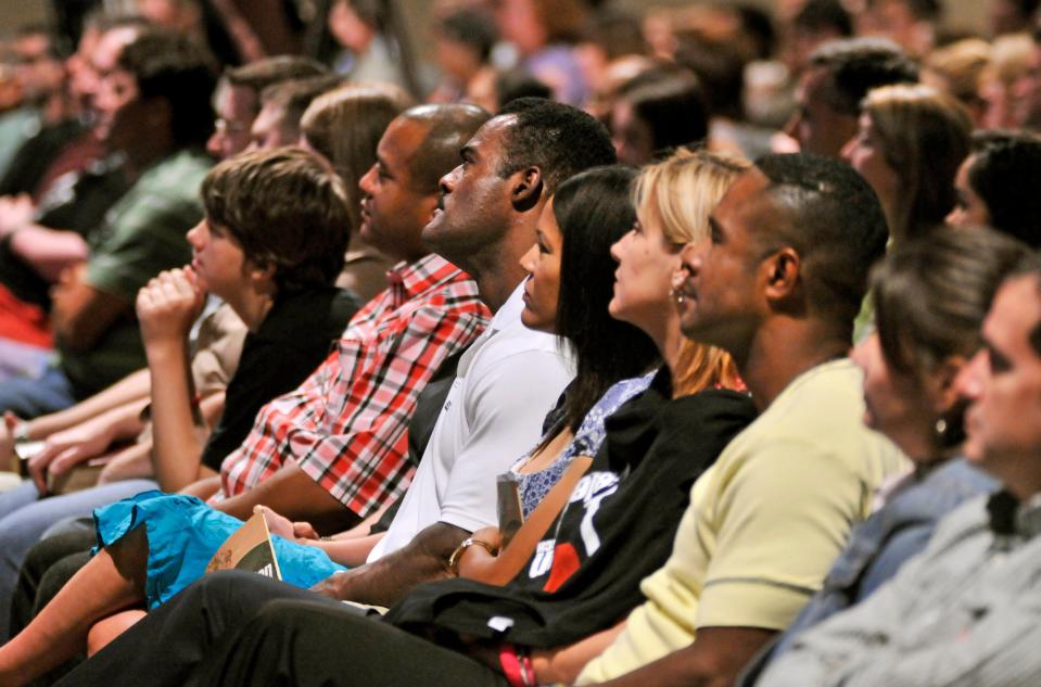 Celebration Church has flourished by connecting with members at a main church dubbed the arena as well as satellite churches and audiences watching online. This photo was taken at a 2008 service marking the church's tenth anniversary.