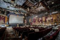 <p>Red, tattered seats still occupy this former movie theater. <br></p><p>Photo: Flickr/<a href="https://www.flickr.com/photos/downloadthis/32571814853/in/photolist-RCg4LH-9fTudq-nwcHpV-vTm52-vTpnr-QR4Nco-6vHN9y-cdqy9S-pNYNzZ-21q1zei-eht7xH-gdVHJ7-eht71k-eht7wc-q5pdcV-a8kXHF-8WXHA2-a8kY16-87LeWE-6zhFk4-6zmBJ7-4w464L-5z76tH-5re9SH-dGQt4k-9LM9QW-BseS2w-nwuFBB-95r9u5-6BKvm3-pVueRK-be28t6-8X1JNo-vTp5i-vTpeC-vToo4-vTmvC-KtcPV-6zh3UK-a9NUqM-vTpLa-87fVTY-9zYmH6-6zmxWC-6zmfZj-5BdwWc-6zmaQQ-6zhBtX-pb5iCy-9LJmCv" rel="nofollow noopener" target="_blank" data-ylk="slk:Phillip;elm:context_link;itc:0;sec:content-canvas" class="link ">Phillip</a></p>