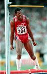 Cuba's Javier Sotomayor celebrates after clearing 2.37m during men's high jump final at the Athens '97 World Championships in Athletics, 06 August. Sotomayor took gold ahead of Poland's second placed Artur Patyrka and third placed Timothy Forsyth of Australia