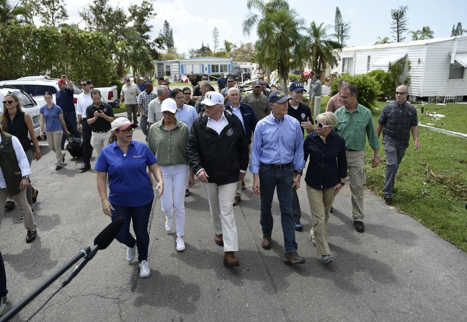 Trump and&nbsp;Florida Governor Rick Scott and his wife Ann Scott tour a neighborhood affected by Hurricane Irma, in Naples, Florida.&nbsp;