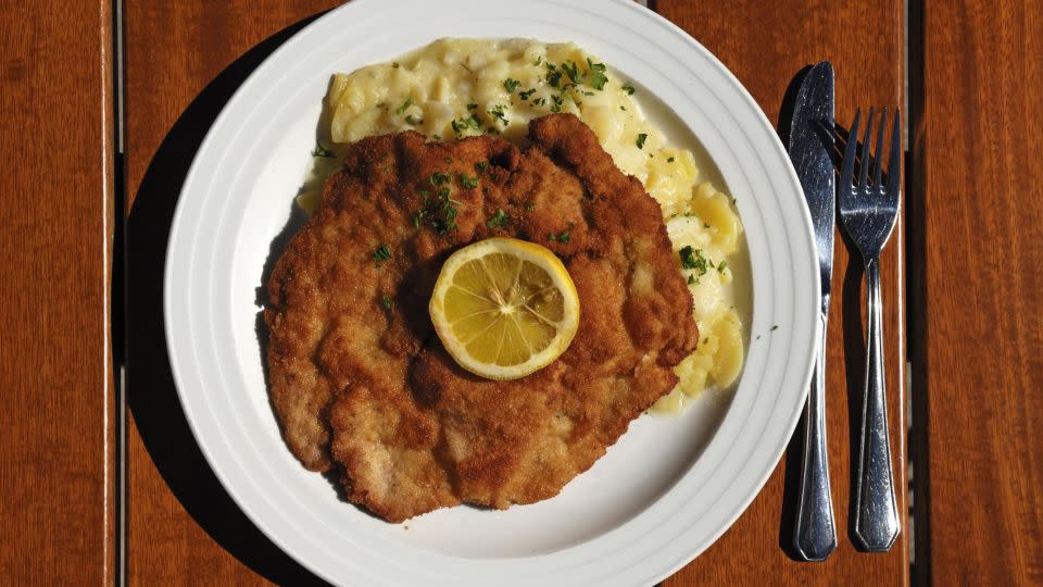 German? Austrian? Italian? Whatever the origins, schnitzel is wildly popular. - Helmut Meyer Zur Capellen/imageBROKER/Shutterstock