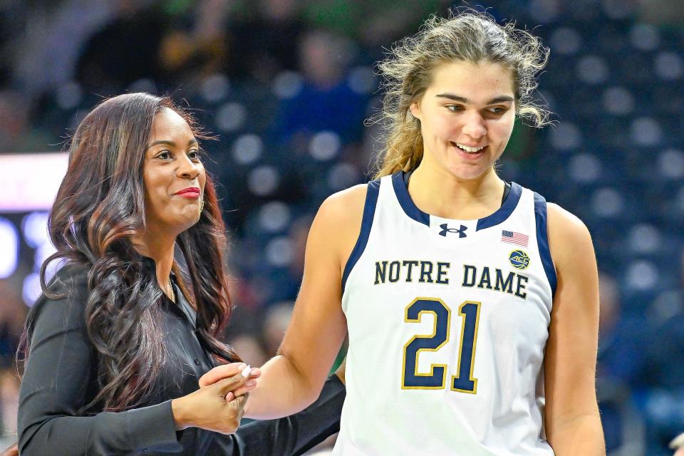 Notre Dame Fighting Irish head coach Niele Ivey talks to forward Maddy Westbeld (21) in the second half against Purdue Northwest Monday, Oct. 30, 2023, at the Purcell Pavilion.