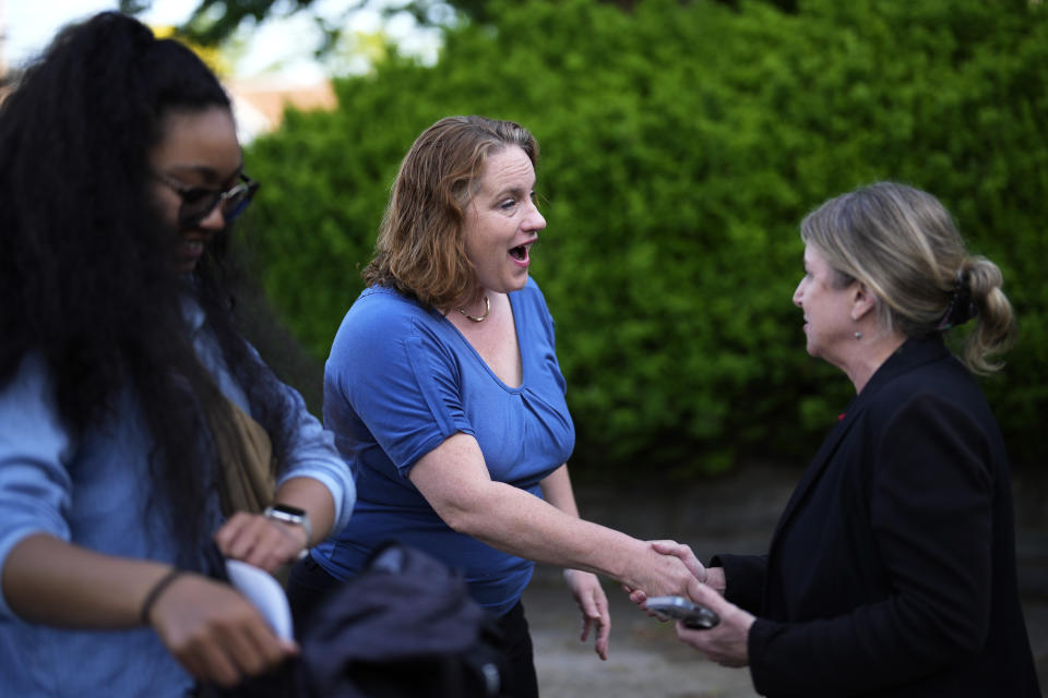 Heather Boyd, center, Democratic candidate for Pennsylvania House of Representatives, greets supporters before voting at her polling place, Christ's Community Church, Tuesday, May 16, 2023, in Drexel Hill, Pa. (AP Photo/Matt Slocum)