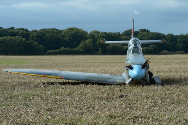 Spitfire emergency landing in field