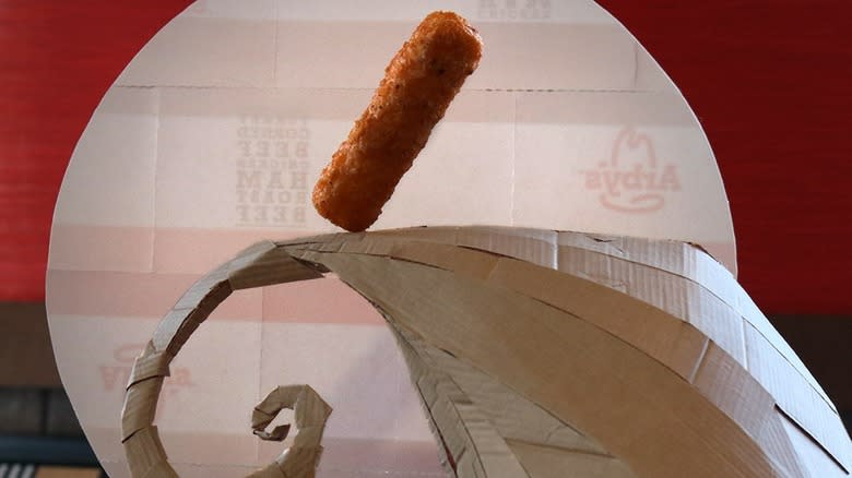 Arby's mozzarella stick on carboard