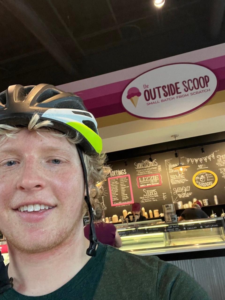 James Douthit takes a selfie at The Outside Scoop in Ankeny. Douthit has been riding his bicycle from Ames to various ice cream shops in central Iowa this summer.
