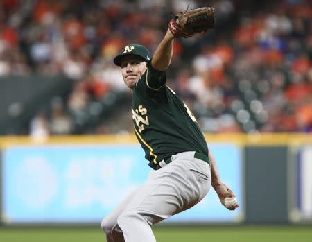 Jul 11, 2018; Houston, TX, USA; Oakland Athletics starting pitcher Chris Bassitt (40) delivers a pitch during the fourth inning against the Houston Astros at Minute Maid Park. Mandatory Credit: Troy Taormina-USA TODAY Sports