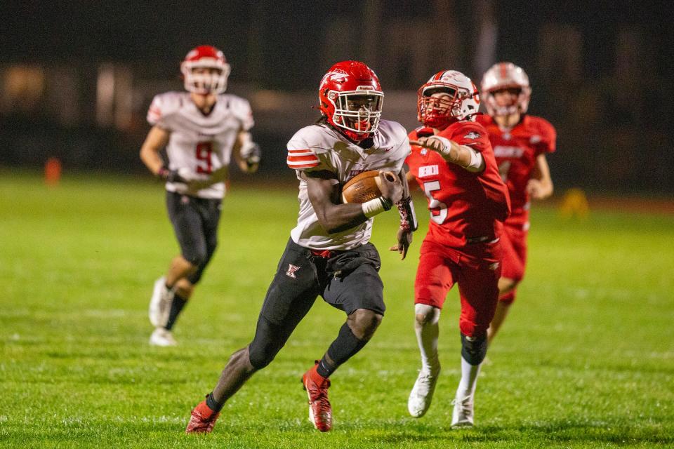 Keyport's quarterback Nazir Treadwell runs the ball for a touchdown during the second half of the Keyport High School vs. Point Pleasant Beach High School football game at Donald T. Fioretti Field in Point Pleasant Beach, NJ Friday, October 6, 2023.