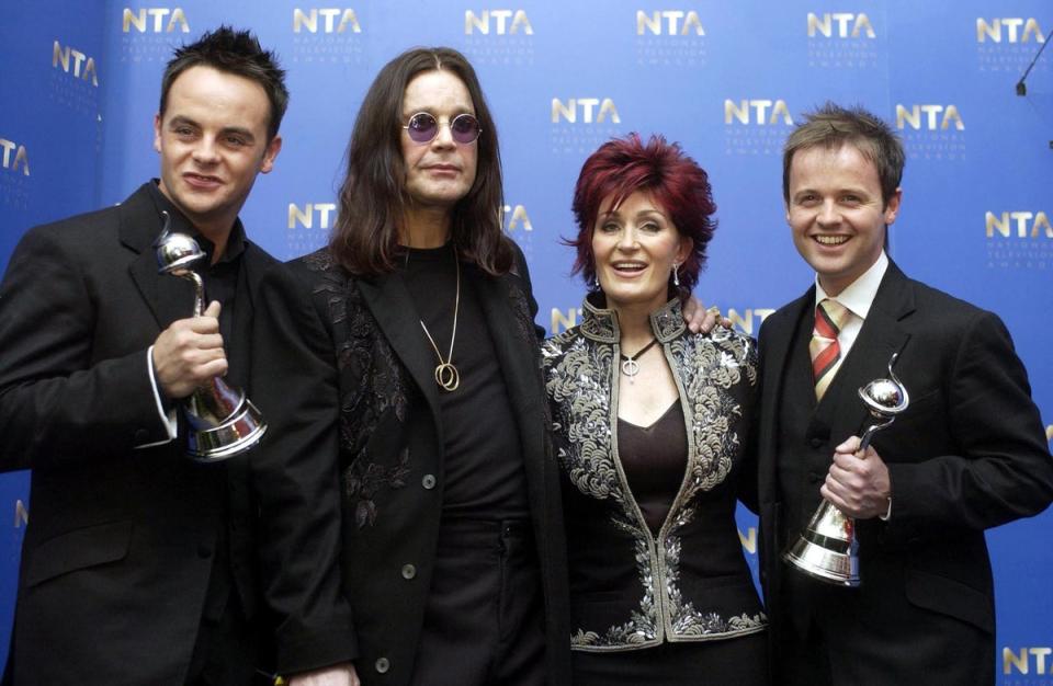 Ant McPartlin and Declan Donnelly with their awards for Most Popular Entertainment Programme for Saturday Night Takeaway with Ozzy and Sharon Osbourne, at the 10th Anniversary National Television Awards 2004, held at the Royal Albert Hall in London (PA)