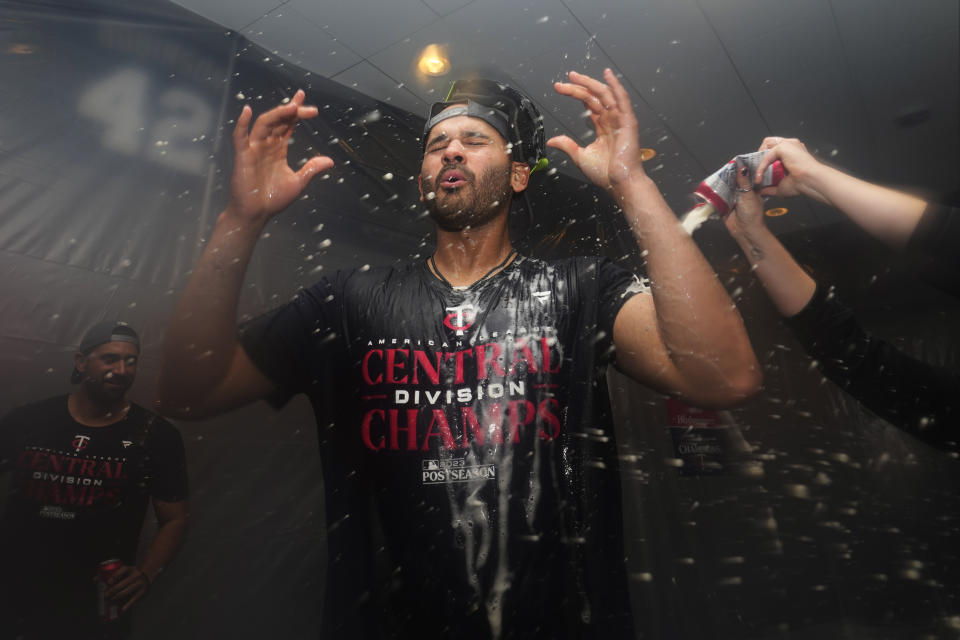 Minnesota Twins' Pablo Lopez celebrates after the Twins clinched the AL Central title with an 8-6 win over the Los Angeles Angels in a baseball game Friday, Sept. 22, 2023, in Minneapolis. (AP Photo/Abbie Parr)