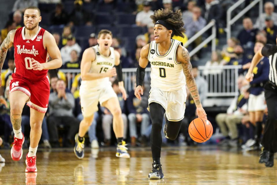 Michigan guard Dug McDaniel dribbles against Nebraska during the first half on Wednesday, Feb. 8, 2023, at Crisler Center.