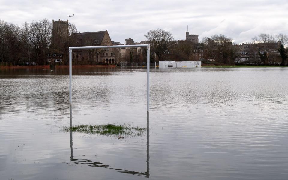 Eton College playing fields flooded after the River Thames has burst its banks in Berkshire