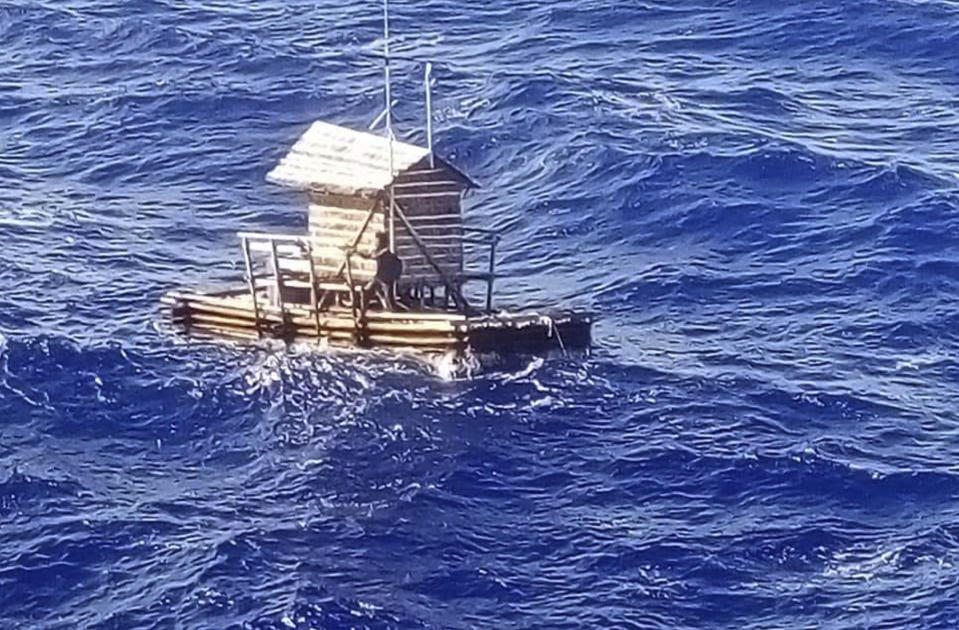 In this undated photo released by Indonesian Consulate General in Osaka, 18-year-old Aldi Novel Adilang is seen on a wooden fish trap floating in the waters near the island of Guam. The Indonesian teenager has survived about 7 weeks adrift at sea after the floating wooden fish trap he was employed to mind slipped its moorings. Aldi's parents and the Indonesian Consulate in Osaka, Japan, said he was rescued by a Panamanian-flagged vessel off Guam on Aug. 31 and returned to Indonesia earlier this month. (Indonesian Consulate General in Osaka via AP)