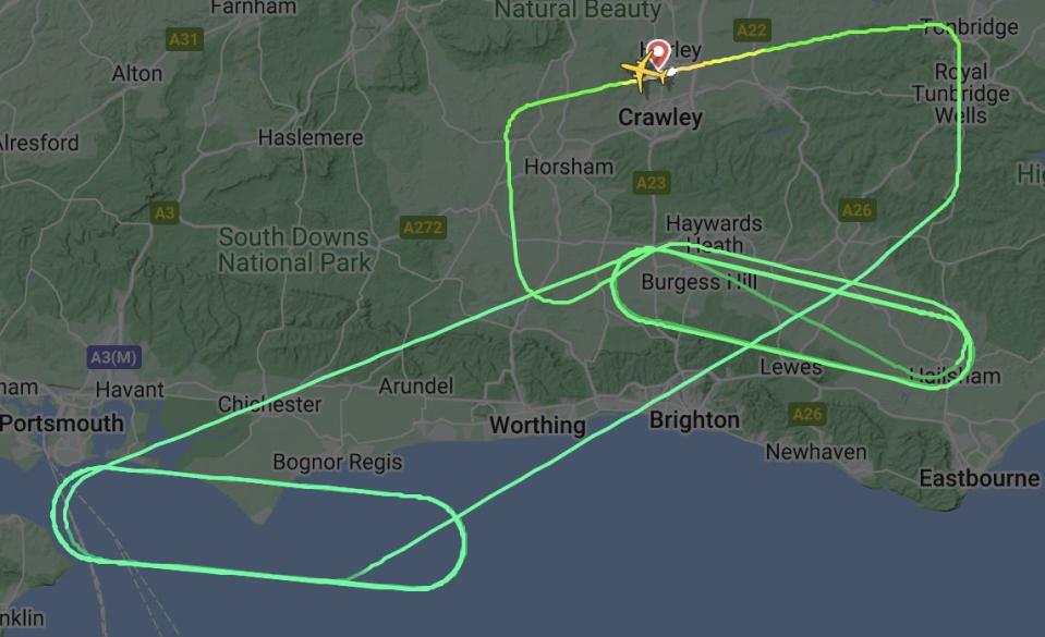 Screenshot of Vueling flight circling the UK coast after taking off from London Gatwick airport.