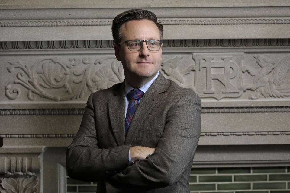 FILE - Republican Rep. Brady Brammer, poses for a portrait at the Utah State Capitol on Jan. 30, 2020, in Salt Lake City. Utah's governor has signed a law requiring biological fathers to pay half of a woman's out-of-pocket pregnancy costs. Brammer said he decided to sponsor the measure because he had grown frustrated with the number of anti-abortion measures going through the Legislature and wanted to pursue legislation that would make it easier to bring life into the world. (AP Photo/Rick Bowmer, File)