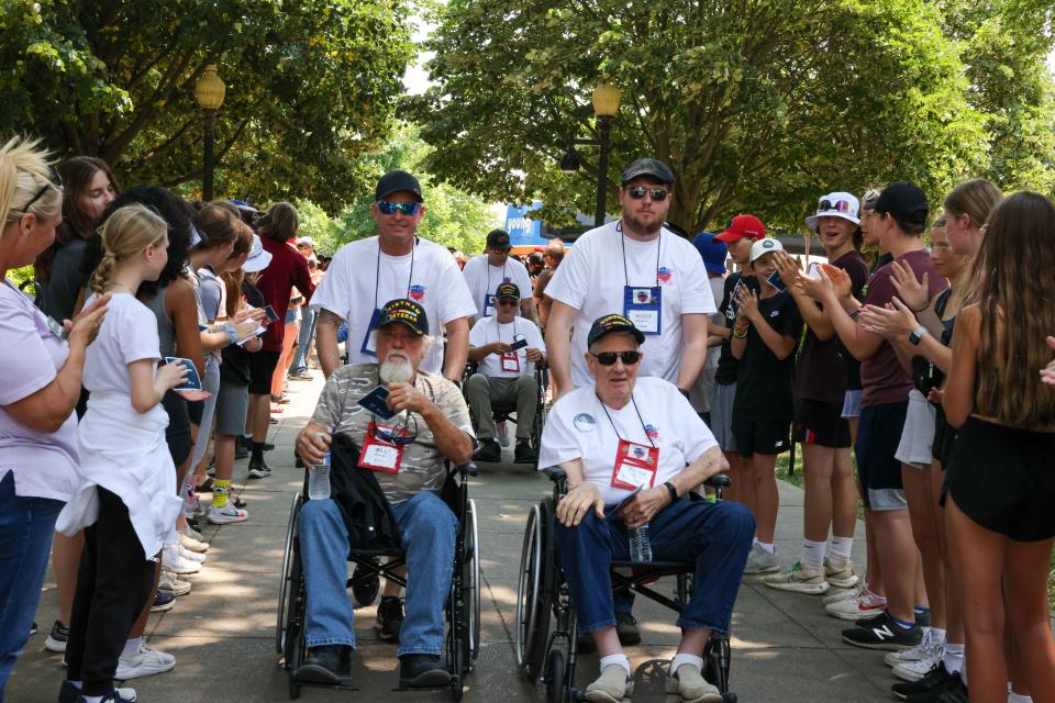 Space Coast Honor Flight veterans get a warm welcome from students at the World War II Memorial in Washington, D.C.