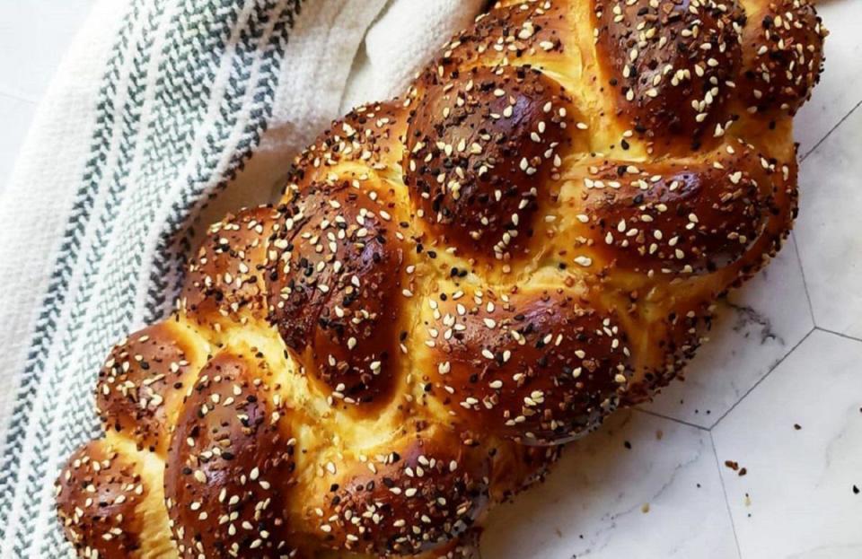 <p>It’s not a Jewish feast without at least one challah. This traditional braided egg bread is light, tender and totally able to be baked at home. Challah tastes even better when smeared with butter and dunked into some <a href="https://www.thedailymeal.com/cook/20-delicious-soup-recipes-are-perfect-fall-gallery?referrer=yahoo&category=beauty_food&include_utm=1&utm_medium=referral&utm_source=yahoo&utm_campaign=feed" rel="nofollow noopener" target="_blank" data-ylk="slk:warm soup;elm:context_link;itc:0;sec:content-canvas" class="link ">warm soup</a>.</p> <p><a href="https://www.thedailymeal.com/best-recipes/best-challah-recipe?referrer=yahoo&category=beauty_food&include_utm=1&utm_medium=referral&utm_source=yahoo&utm_campaign=feed" rel="nofollow noopener" target="_blank" data-ylk="slk:For the Best Challah Ever recipe, click here.;elm:context_link;itc:0;sec:content-canvas" class="link ">For the Best Challah Ever recipe, click here.</a></p>