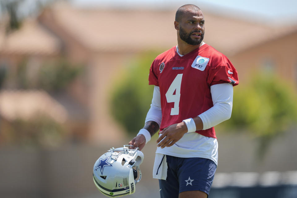 Dallas Cowboys quarterback Dak Prescott stands during NFL football training camp Thursday, July 25, 2024, in Oxnard, Calif. (AP Photo/Ryan Sun)