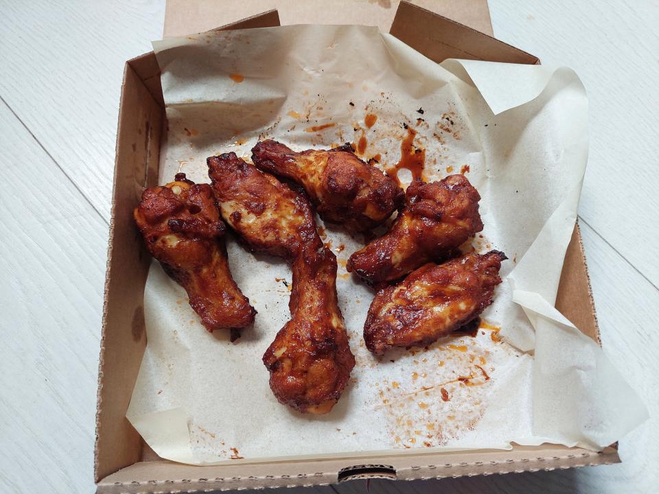 Chicken wings from Papa John's, displayed in a box