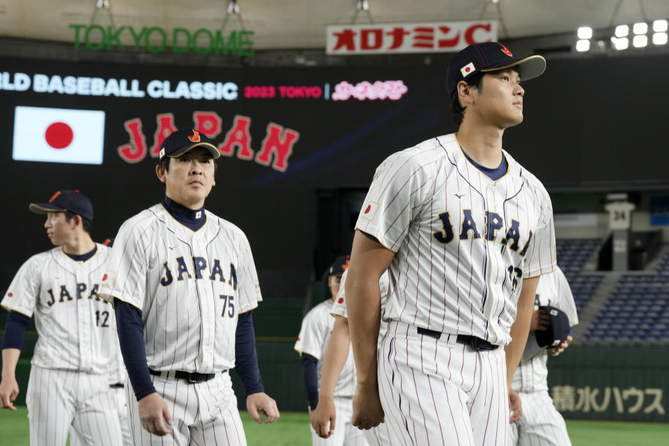 Japan's Shohei Ohtani, participates a group photo session before an official training session prior to the Pool B game at the World Baseball Classic (WBC) at the Tokyo Dome Wednesday, March 8, 2023, in Tokyo. (AP Photo/Eugene Hoshiko)