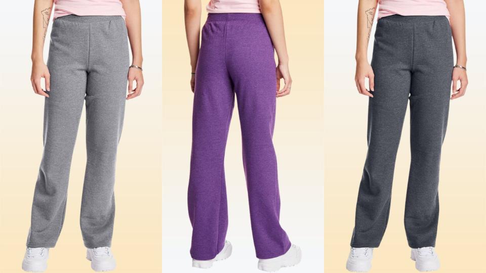 three different models wearing sweats in light gray, purple and dark gray on a yellow background. 