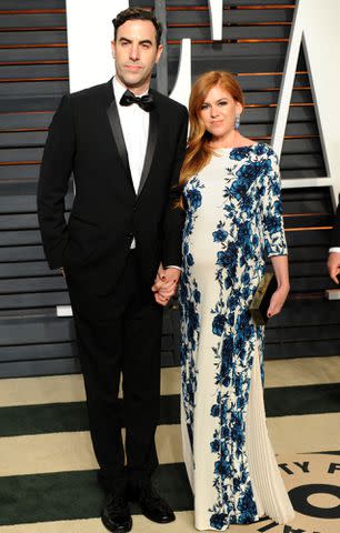 <p>Jon Kopaloff/FilmMagic</p> Sacha Baron Cohen and Isla Fisher at the 2015 Vanity Fair Oscar Party.