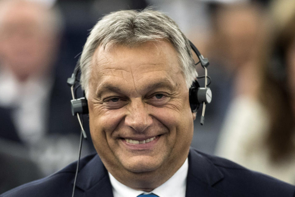 Hungary's Prime Minister Viktor Orban smiles at the European Parliament in Strasbourg, eastern France, Tuesday Sept.11, 2018. The European Parliament debates whether Hungary should face political sanctions for policies that opponents say are against the EU's democratic values and the rule of law. (AP Photo/Jean-Francois Badias)