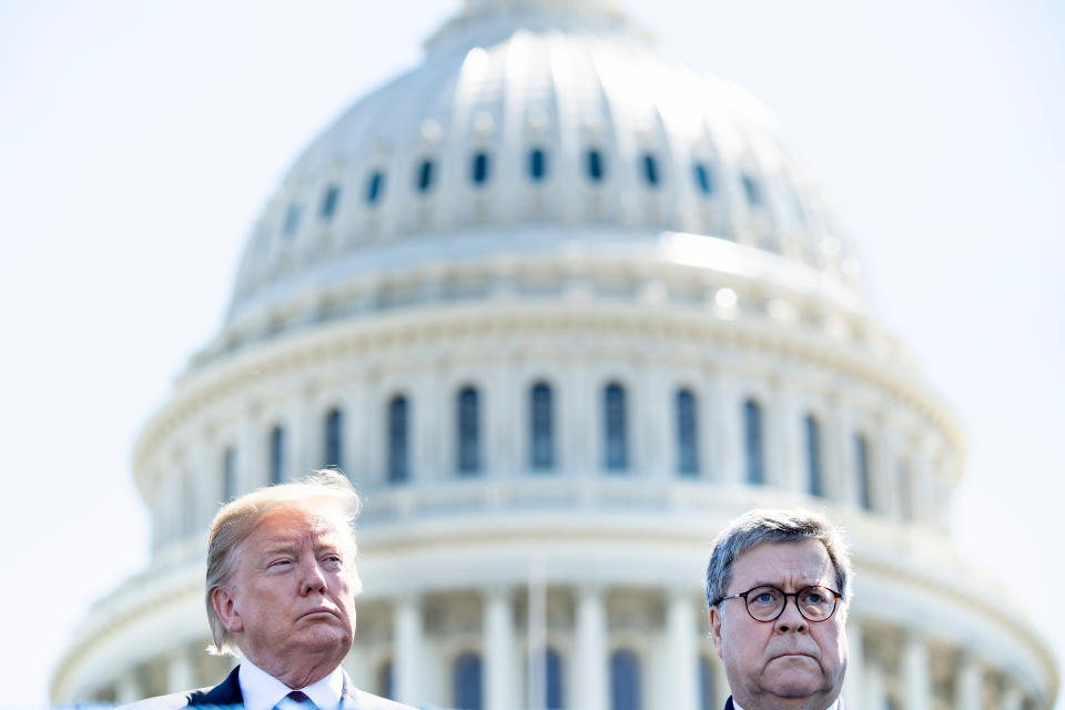 President Trump and Attorney General William Barr attend the 38th Annual National Peace Officers Memorial Service in Washington, D.C., on May 15, 2019. (Photo by Brendan Smialowski/AFP via Getty Images)