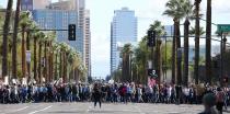 Thousands of demonstrators march in support of the Women's March on Washington Saturday, Jan. 21, 2017, in Phoenix. Thousands of protesters in Phoenix joined in support of those in cities around the globe protesting against Donald Trump as the new United States president. (AP Photo/Ross D. Franklin)