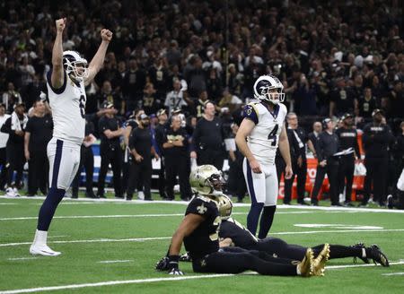 Jan 20, 2019; New Orleans, LA, USA; Los Angeles Rams kicker Greg Zuerlein (4) celebrates with punter Johnny Hekker (6) after kicking the tying field goal against the New Orleans Saints during the fourth quarter in the NFC Championship game at Mercedes-Benz Superdome. Mandatory Credit: Matthew Emmons-USA TODAY Sports