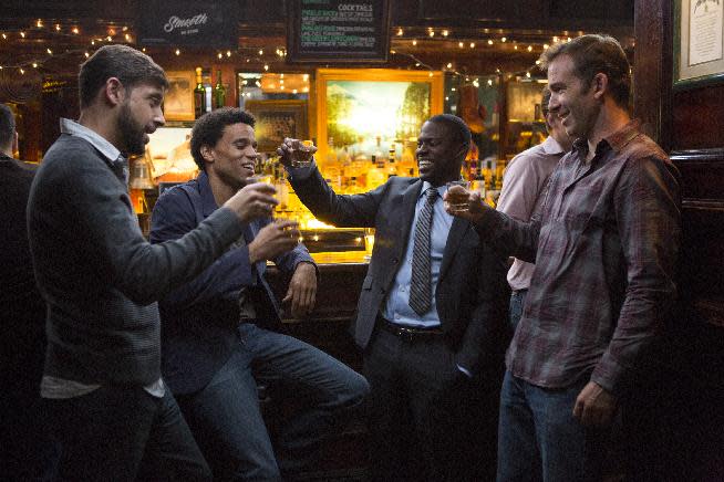 This image released by Sony Pictures shows, from left, David Greenman, Michael Ealy, Kevin Hart and Bryan Callen in a scene from "About Last Night." (AP Photo/Sony Pictures, Matt Kennedy)