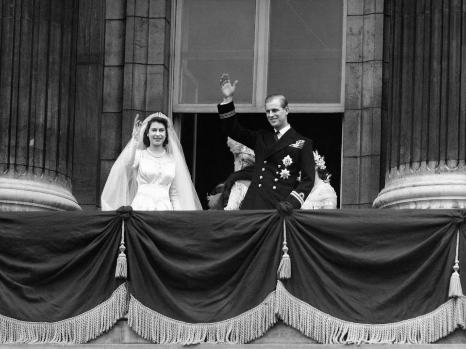 <p>The bride, Princess Elizabeth and groom, the newly created Duke of Edinburgh on the balcony of Buckingham Palace after they were married in a ceremony at Westminster Abbey (PA Archive) </p>