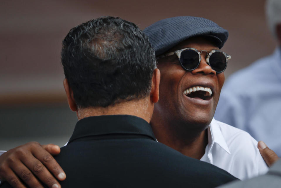 <p>Actor Samuel Jackson, right, greets Rev. Jesse Jackson Sr. as they take their seats for the dedication ceremony of the Smithsonian Museum of African American History and Culture on the National Mall in Washington, Saturday, Sept. 24, 2016. (AP Photo/Pablo Martinez Monsivais)</p>