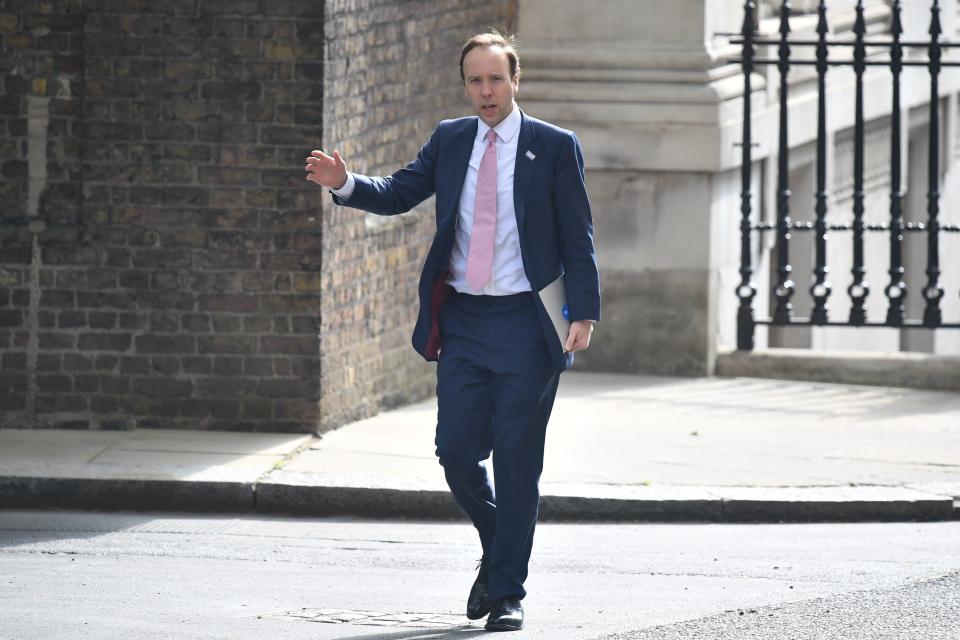 Britain's Health Secretary Matt Hancock arrives in Downing street in central London on May 21, 2020 for the daily novel coronavirus COVID-19 briefing. (Photo by DANIEL LEAL-OLIVAS / AFP) (Photo by DANIEL LEAL-OLIVAS/AFP via Getty Images)