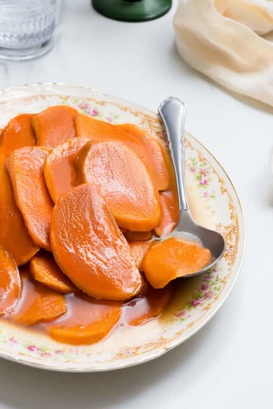 <p>Grandbaby Cakes</p><p>There is nothing more southern than this Candied Sweet Potatoes recipe. Sweet potatoes are cooked until tender and soft in a buttery and sweet glaze filled with spices and deliciousness making the best-candied yams dish ever!</p><p><strong>Get the recipe: <a href="https://grandbaby-cakes.com/candied-sweet-potatoes/" rel="nofollow noopener" target="_blank" data-ylk="slk:Candied Sweet Potatoes Recipe;elm:context_link;itc:0;sec:content-canvas" class="link rapid-noclick-resp">Candied Sweet Potatoes Recipe</a></strong></p>