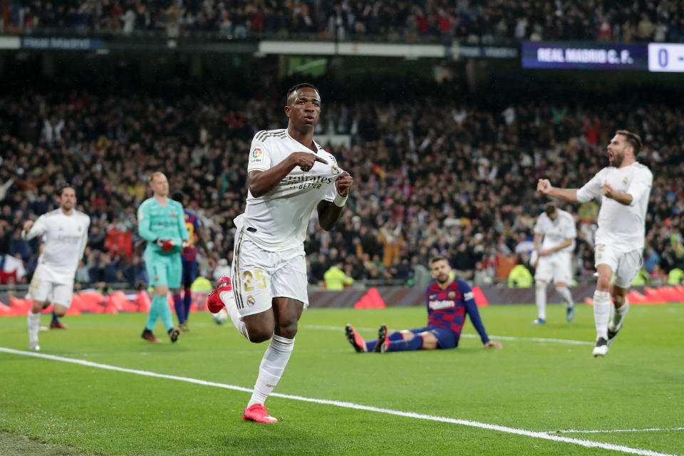 Vinícius Júnior celebrates after scoring the winning goal for Real Madrid against Barcelona in Sunday's El Clásico. (Photo by Gonzalo Arroyo Moreno/Getty Images)