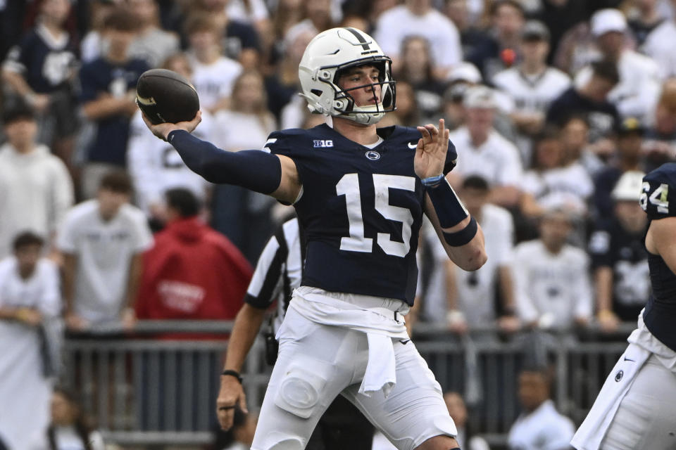 Penn State quarterback Drew Allar (15) throws a pass against Indiana during the first half of an NCAA college football game, Saturday, Oct. 28, 2023, in State College, Pa. (AP Photo/Barry Reeger)