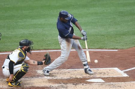 Jun 19, 2018; Pittsburgh, PA, USA; Milwaukee Brewers center fielder Lorenzo Cain (6) singles against the Pittsburgh Pirates during the third inning at PNC Park. Mandatory Credit: Charles LeClaire-USA TODAY Sports