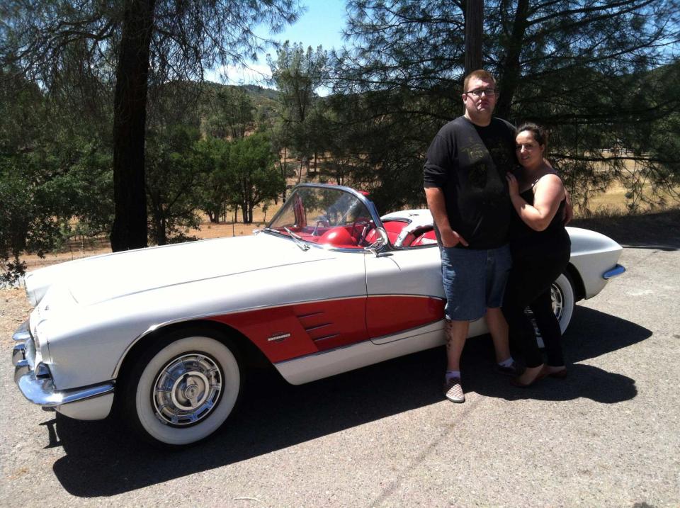 At Brandon Pettit's trial, prosecutors argued that Brandon's motive was financial. They told the jury that Brandon had hoped to inherit his parents' life insurance and sell his father's vintage cars. Brandon is pictured with Susan Sanchez and his father's Corvette.  / Credit: Lauren Pettit